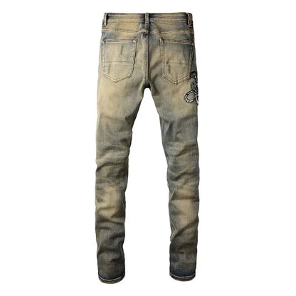 Snake Embroidery Tapered Denim Jeans™ rosses clothing