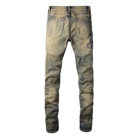 Snake Embroidery Tapered Denim Jeans™ rosses clothing