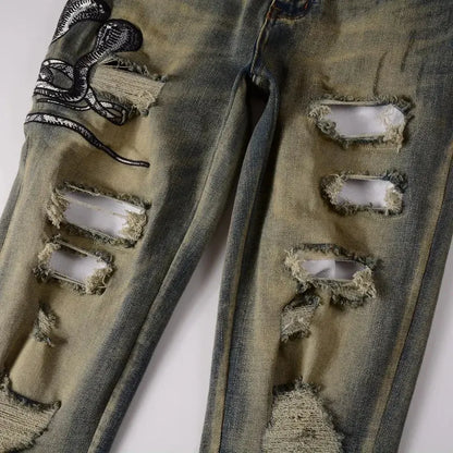 Snake Embroidery Tapered Denim Jeans™ rosses clothing